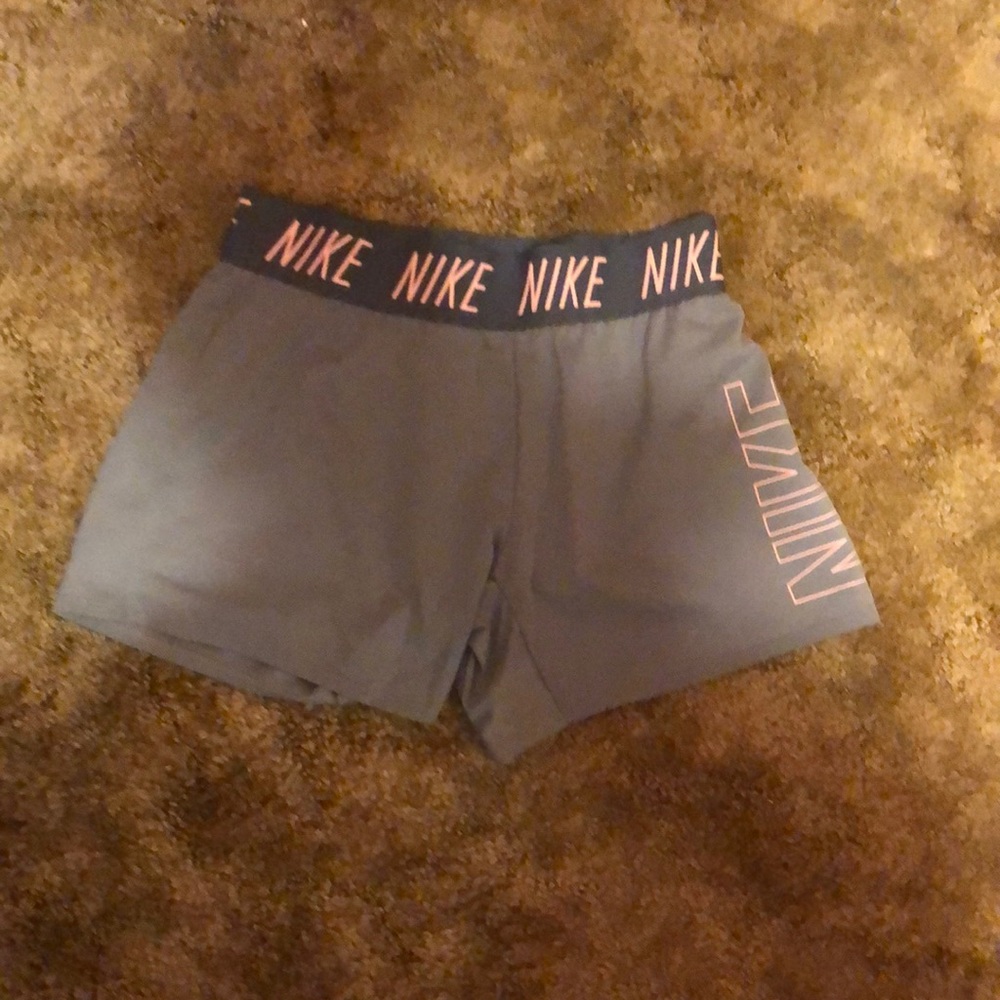 Gray and pink Nike shorts